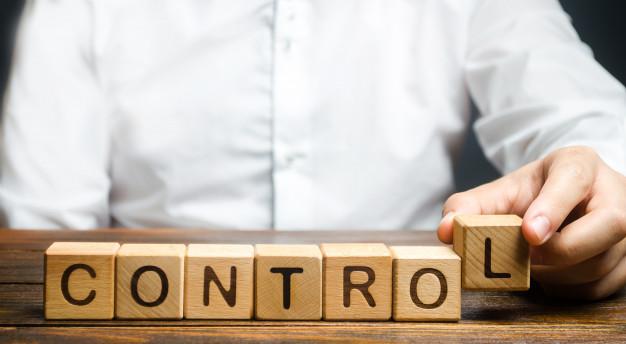 Man makes up the word controls. business and process management concept Premium Photo